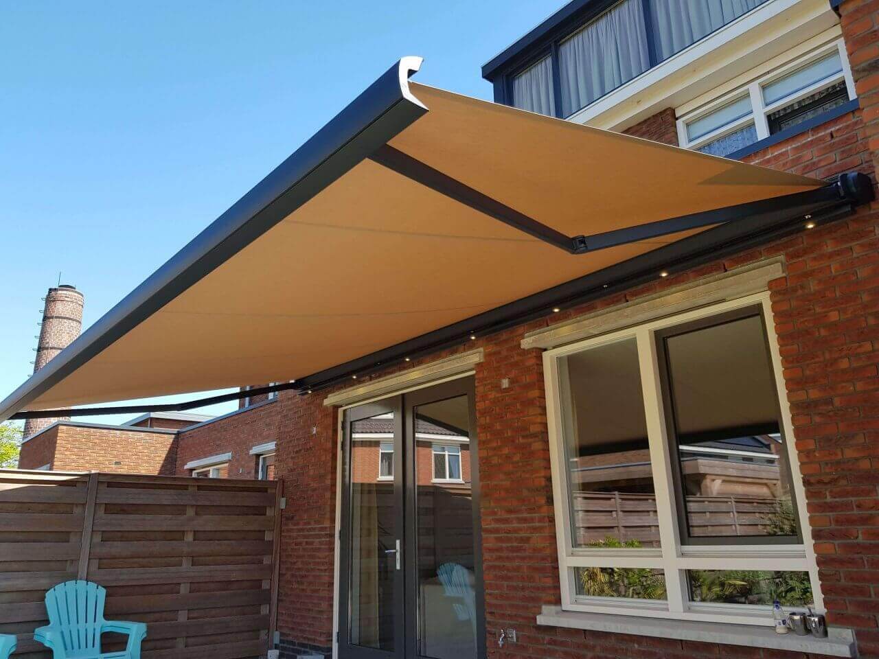 Hoeveel wind kan een knikarmscherm hebben